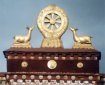 Wheel and Dear on roof of Tibetan Buddhist monastery. Photo © Lisa Diax