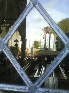 Window View into Widecombe on the moor church. Photo: RSR