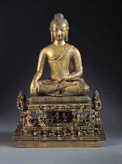 Buddha and Adorants on the Cosmic Mountain  India: Kashmir, c. 700  Bronze with silver and copper inlay  13-1/4 x 9-1/2 x 4-3/4 in. (33.7 x 24.1 x 12.1 cm)  The Norton Simon Foundation