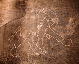 Rock carving of elephants in Tadrart Acacus region of Libya