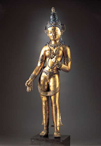 Tara  Nepal or Tibet, c. 1300  Gilt-copper alloy with semiprecious stones and pigment  34 3/4 in x 11 in x 5 1/2 in (88.3 x 27.9 x 14 cm)  The Norton Simon Foundation