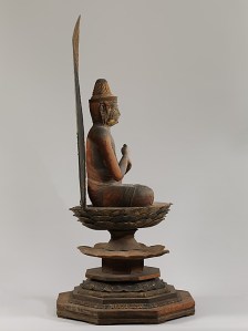 Dainichi Nyorai is known as the Supreme Buddha of the Cosmos in Esoteric Buddhist thought. He is the source from whom all other deities and everything in the universe emanate, as light does from the sun. Here, he appears in a form known as Ichiji Kinrin (Sanskrit: Ekaksara-ushnisha-chakra), or Dainichi Nyorai is known as the Supreme Buddha of the Cosmos in Esoteric Buddhist thought. Mudra, which holds the power to restrain passions that hinder enlightenment. Photo © Metropolitan Museum of Art