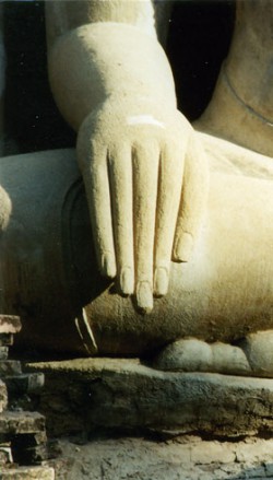Buddha in earth touching pose. Photo © Lisa Daix