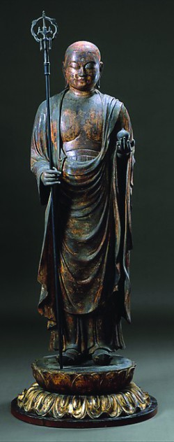 Photo © Metropolitan Museum of Art. Bodhisattva Jizō dressed as an itinerant monk holds a wish-granting jewel and a monk's staff. The bodhisattva Jizō dressed as an itinerant monk holds a wish-granting jewel and a monk's staff with six rings