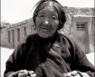 Elderly-Tibetan-with-necklacePhotographs Taken During a Journey Around Tibet in 1997 by Linda Griffiths