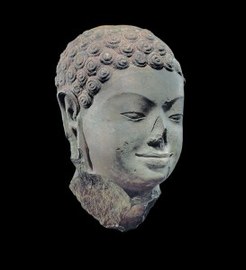 Head of Buddha, Southern Cambodia, 7th century. © Metropolitan Museum of Art.