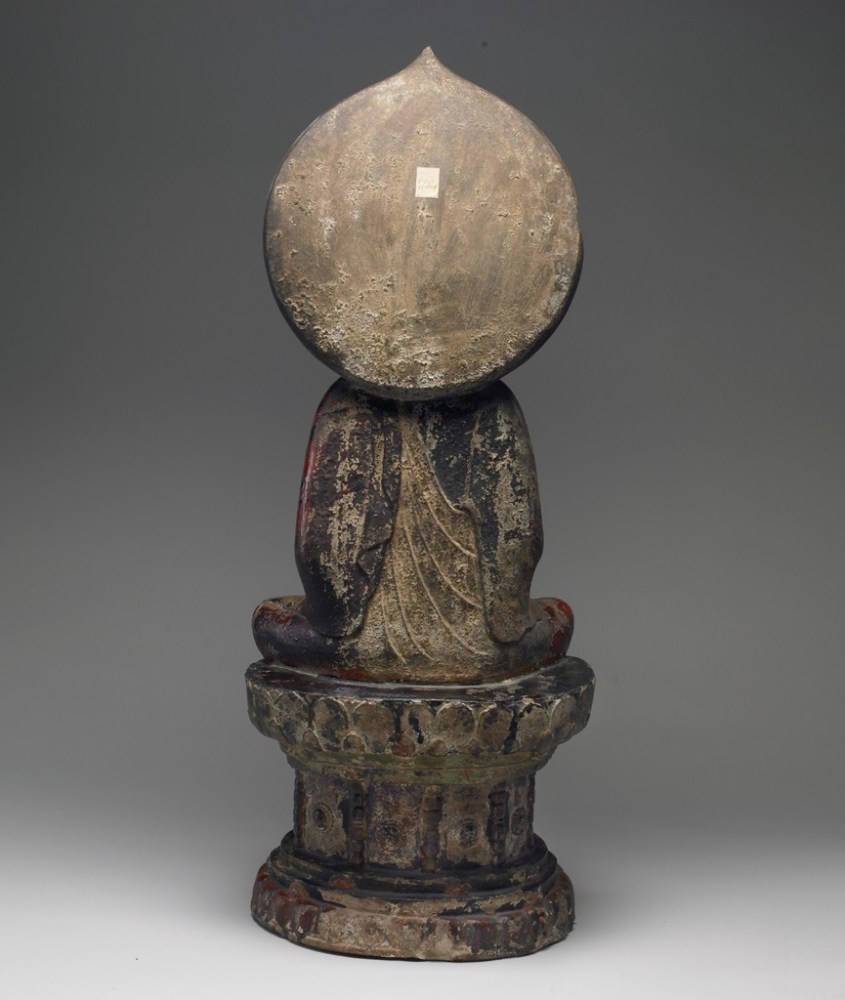 Seated Buddha Shakyamuni, the Right Hand in Abhaya Mudra, the Left Hand Holding a Jewel, Chinese, late 6th century. © Harvard Art Museums/Arthur M. Sackler Museum, Bequest of Grenville L. Winthrop