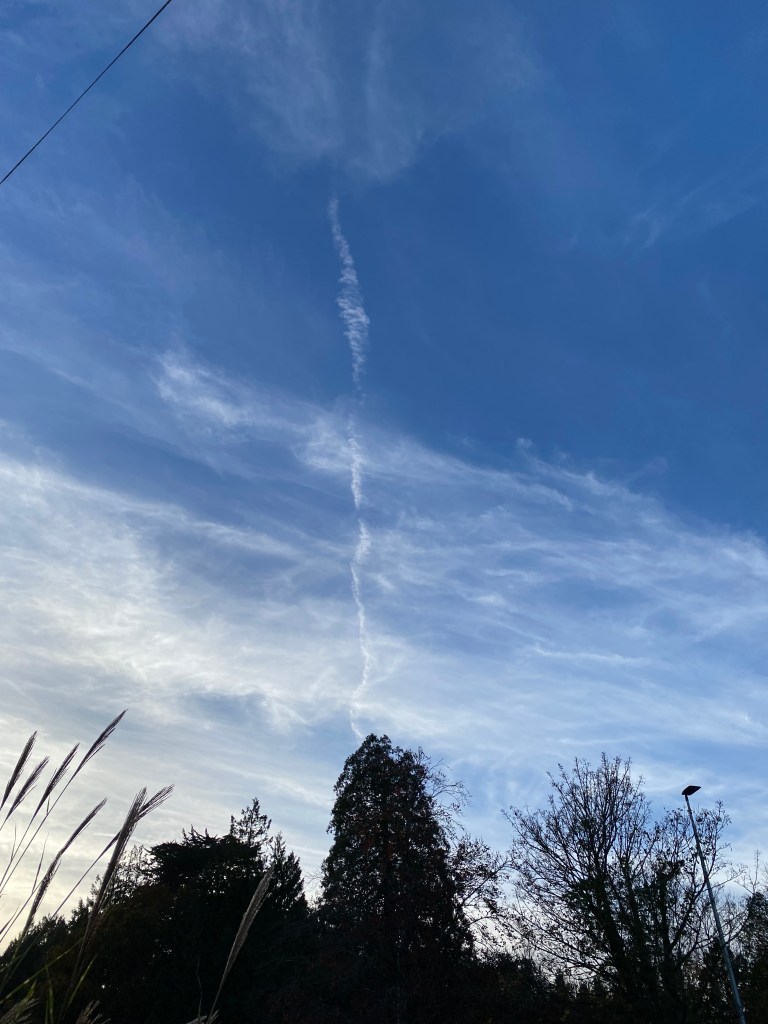 Clouds are putting on a display in the azure sky.