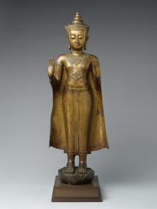 Standing Crowned Buddha gesturing protection.