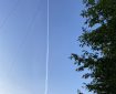 Jet vapour in a blue sky.