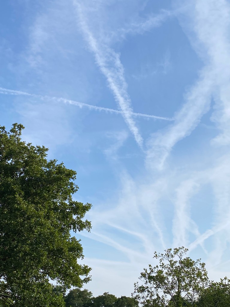 Clouds criss-cross in the sky over Totnes.